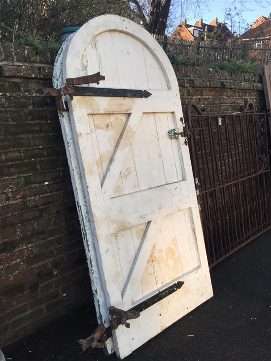 Two white painted doors, with wrought hinges